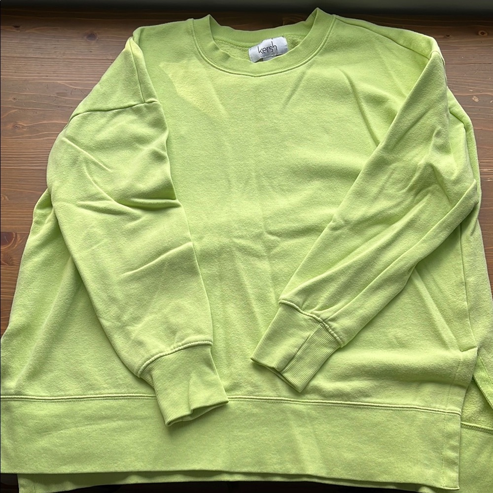 Women’s bright green sweatshirt